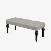 Soft grey 42-inch Ottoman bench with linen fabric, button-tufted seat, Roman column feet, and skid foot pads.