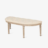 Beige Ottoman Bench with vintage half-moon design, fluted legs, linen cushion, and skid foot pads.