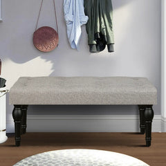 Soft grey 42-inch Ottoman bench with linen fabric, button-tufted seat, Roman column feet, and skid foot pads.