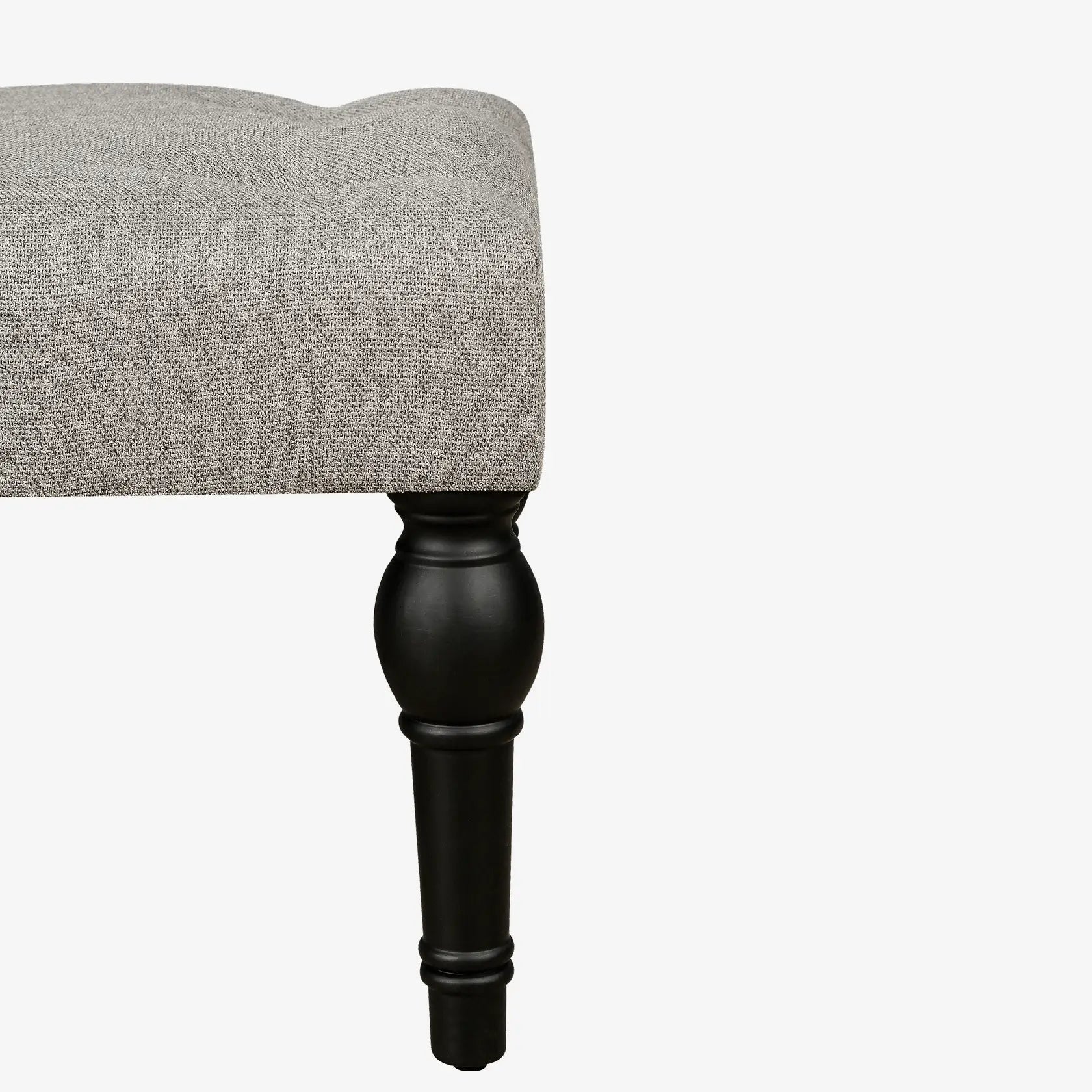 Soft grey 42-inch Ottoman bench with linen fabric, button-tufted seat, Roman column feet, and skid foot pads.